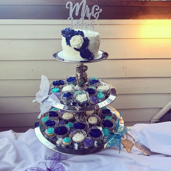 3-tier silver serving piece shown displaying cupcakes