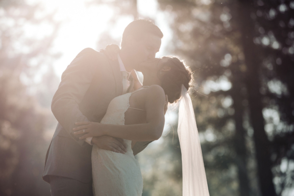 Bridal couple kissing