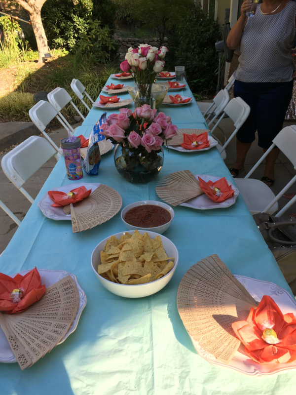Octagon china on rectangle folding tables and basic white folding chairs