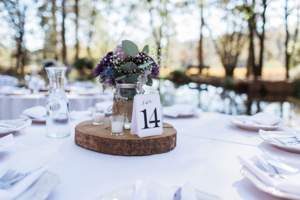 Centerpiece focus on a 60" round folding table.